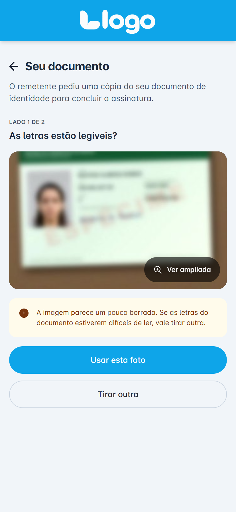 tela de conferência com o aviso de imagem borrada, os botões "Usar esta foto" e "Tirar outra"